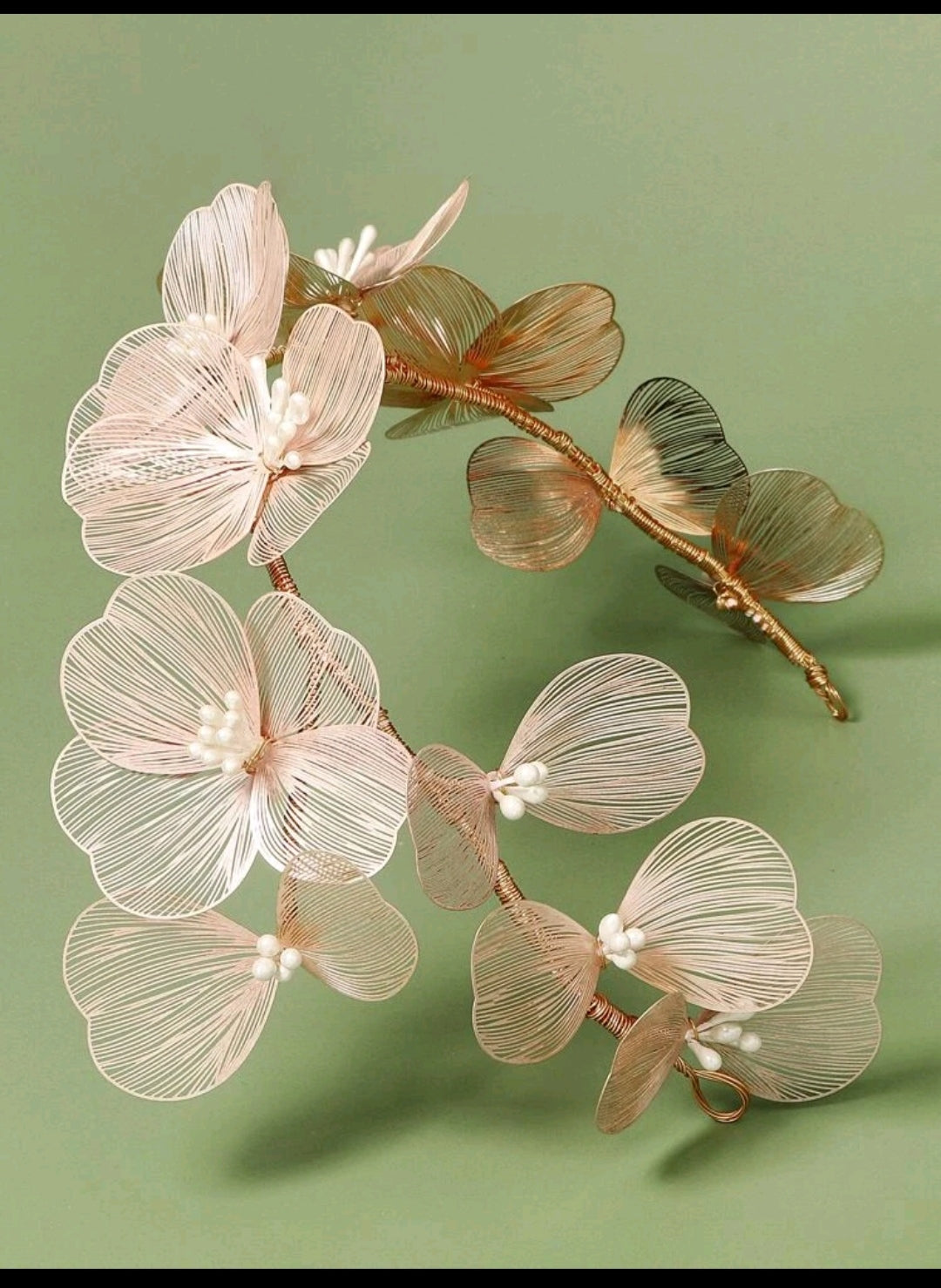 Arranjo rosê de folhas metalizadas 18E59E0