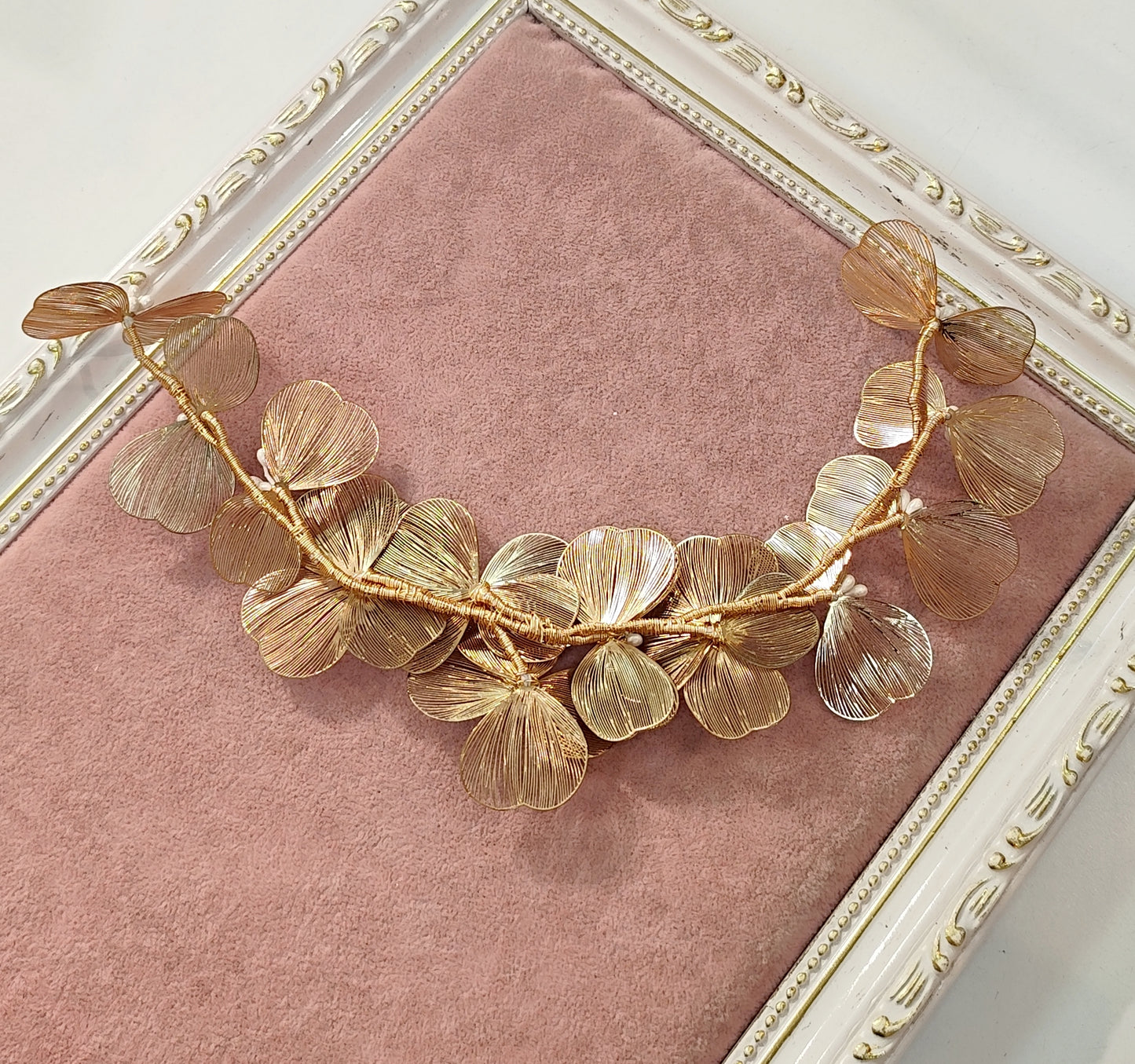 Arranjo rosê de folhas metalizadas 18E59E0